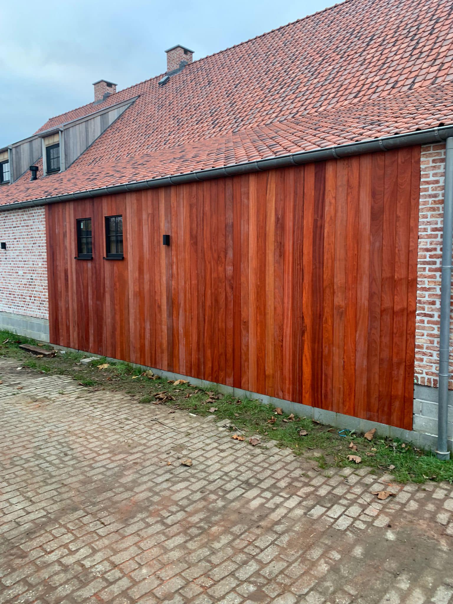 Gevelbekleding als poort